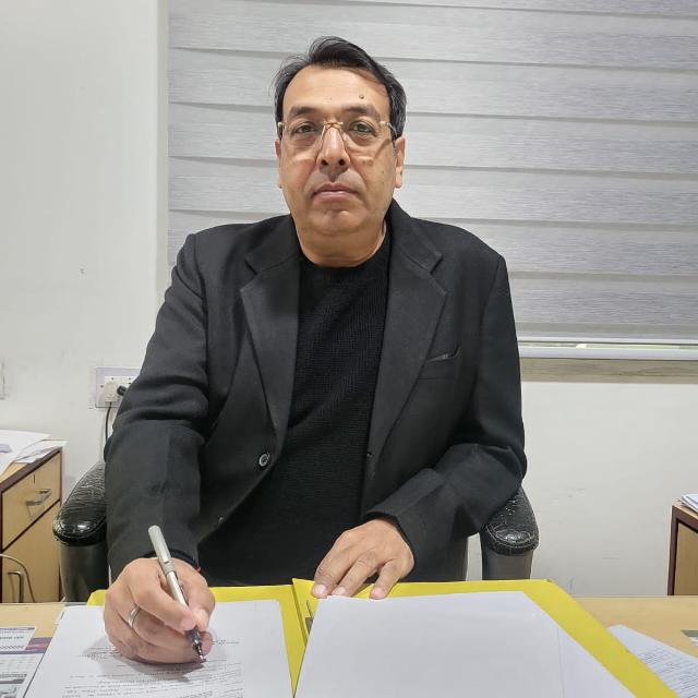 Principal, Dr. Dinesh Sharma